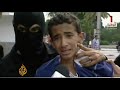 Tunisia's interim government imposes curfew