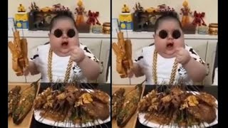 Yemek Yiyen ve Doymayan Çinli çocuk