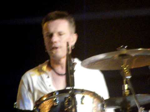 Larry Mullen Jr U2's drummer singing backing vocals Moment of Surrender