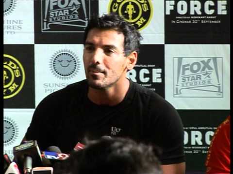 John Abraham Flexes His Bulges