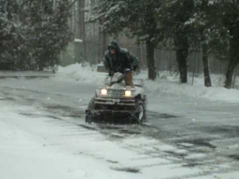 POLARIS 4WD DIESEL ATV PLOWING SNOW IN MARYLAND.