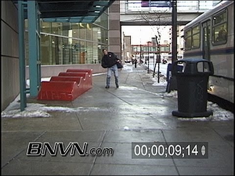 12/22/2003 People walking on slippery sidewalk video