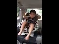 Mickey Tal dancing in the car