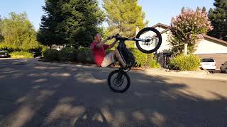 Sur-Ron electric bike slow speed wheelie