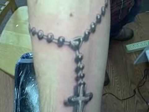 Tags:tattoo rosary monster joe black and gray
