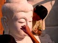 Mandalay in Burma, working on a marble statue