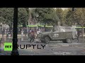 RAW: Clashes, water cannons & riot dogs at education reform rally in Chile