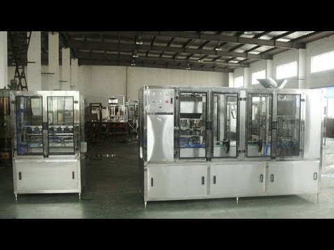 Rotary glass bottles wine washing filling capping shrinking carton sealing machine integrated line