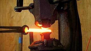 Star Foundry Power Hammer Forging railroad spike into taper for meat turner.