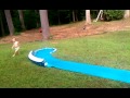 Playing on the slip and slide at papaw's