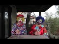 Two Clowns Enjoy a Martini