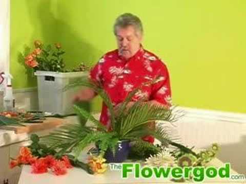  the Flowergod designs an exotic luau centerpiece for a wedding or luau