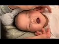 Baby enjoys a relaxing face massage