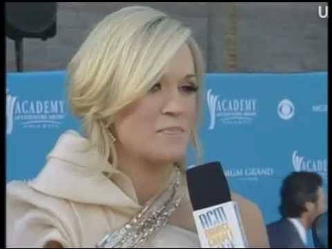 Carrie Underwood gets interviewed by Nan Kelley wearing Jovani style 