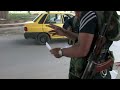Taxi drivers dodge snipers on Syrian frontline