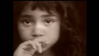 Phil Collins - Another Day In Paradise Official Music Video