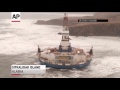 Raw: Oil rig aground in choppy seas, high winds