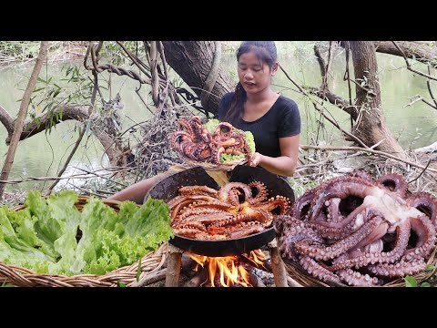 Play this video Survival cooking in forest- Cooking spicy Octopus salad for dinner