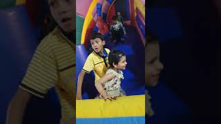 Kids Playing On Jumping Bounce