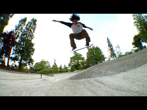 SKATEBOARDING IN A DRAINED FOUNTAIN