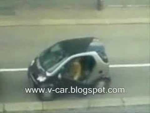 Woman Parking A Smart - Very Smart