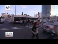 Raw: Panic in Tel Aviv As Siren Warns of Attack