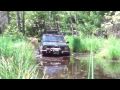 Shawns Jeep Cherokee in the water trenches, Deep Stuff!