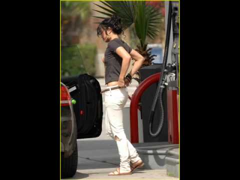 Thu 19 March 2009 Vanessa Hudgens keeps it cool as she puts gas in the car 