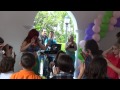 Ariel (The Little Mermaid) playing with kids.Party Rentals on Four J Bouncer