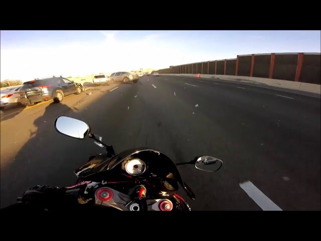 Motorcyclist Dodges Car Crash At Last Second On Highway - Video