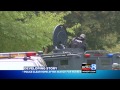 Home surrounded, suspects sought