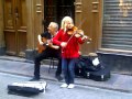 Young girl violinist with his father...!!! Amazing