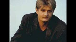 Watch Tom Cochrane This Is The World video