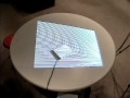 Automatic Projector Calibration with Embedded Light Sensors