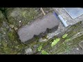 Burning a peat briquette in a Stainless Steel Grover Rocket Stove