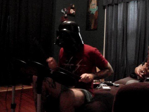 darth vader tattoo. darth vader playing rock band.