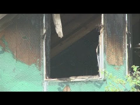 Two charged in Las Vegas murder fire...