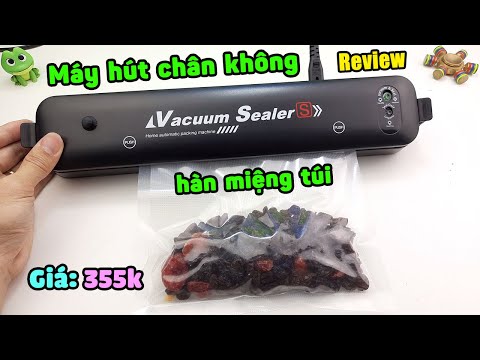 Trên tay máy hút chân không kiêm hàn miệng túi mini