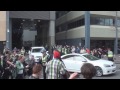 Anti-Abbott protester tackled onto road, getting him almost hit by car