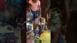 LabakCare's young volunteers packing hygienic products for a soup kitchen in Camden, New Jersey