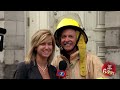 Fireman Interviewed While Building Burns