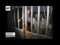 Raw: Police in Honduras Find Gold-plated AK-47