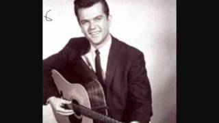 Watch Conway Twitty Okie From Muskogee video