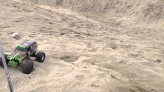 RC monster trucks at beach