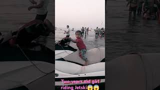 Two Years Old Girl Riding Jetski
