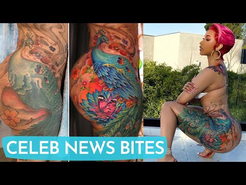 Cardi B Reveals MASSIVE Peacock Tattoo And It Looks PAINFUL!