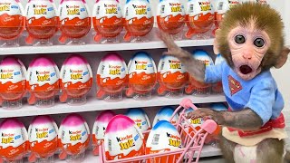 Monkey Baby Bon Bon Doing Shopping In Kinder Joy Eggs Store And Eat Chocolate With The Puppy