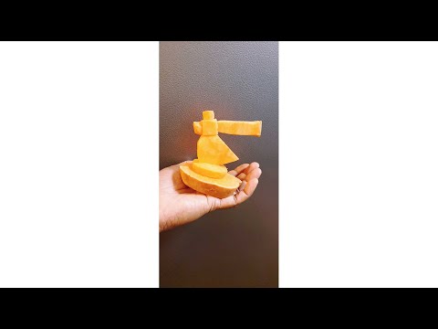 Vegetable Sculpture |  Axe | Vegetable Art work | Vegetable sculpture |Sweet potato art