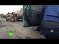 RAW: Sniper convoy crossfire - RT reporters in E. Ukraine