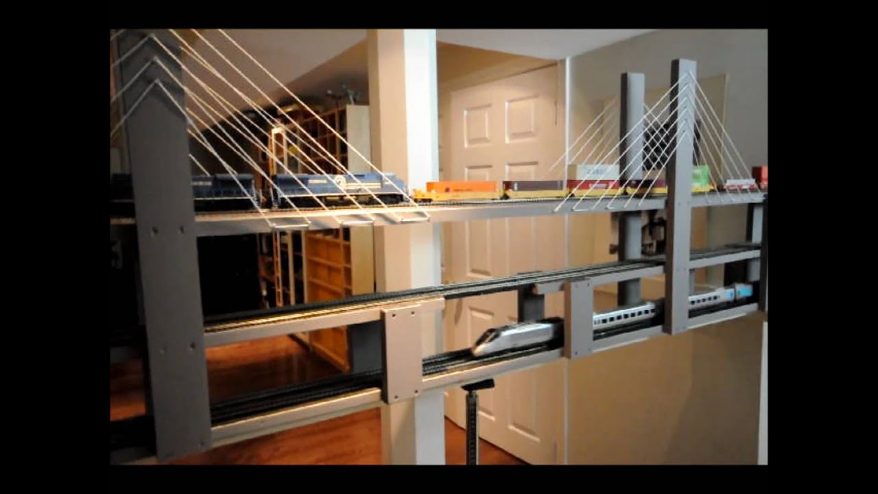 HO Model Train Shelf Layout Update: The Bridge and The City.wmv 